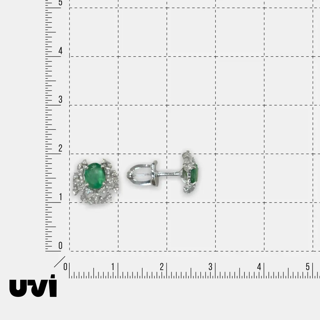Серьги-пусеты из белого золота с изумрудами