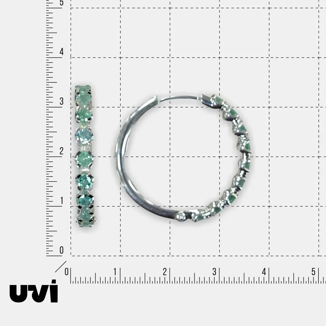 Серебряные серьги-конго с изумрудами