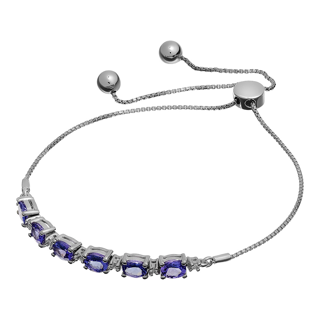 Серебряный браслет 925 пробы; вставки 6 Танзанит 1,96 ct; 7 Топаз белый 0,15 сt;