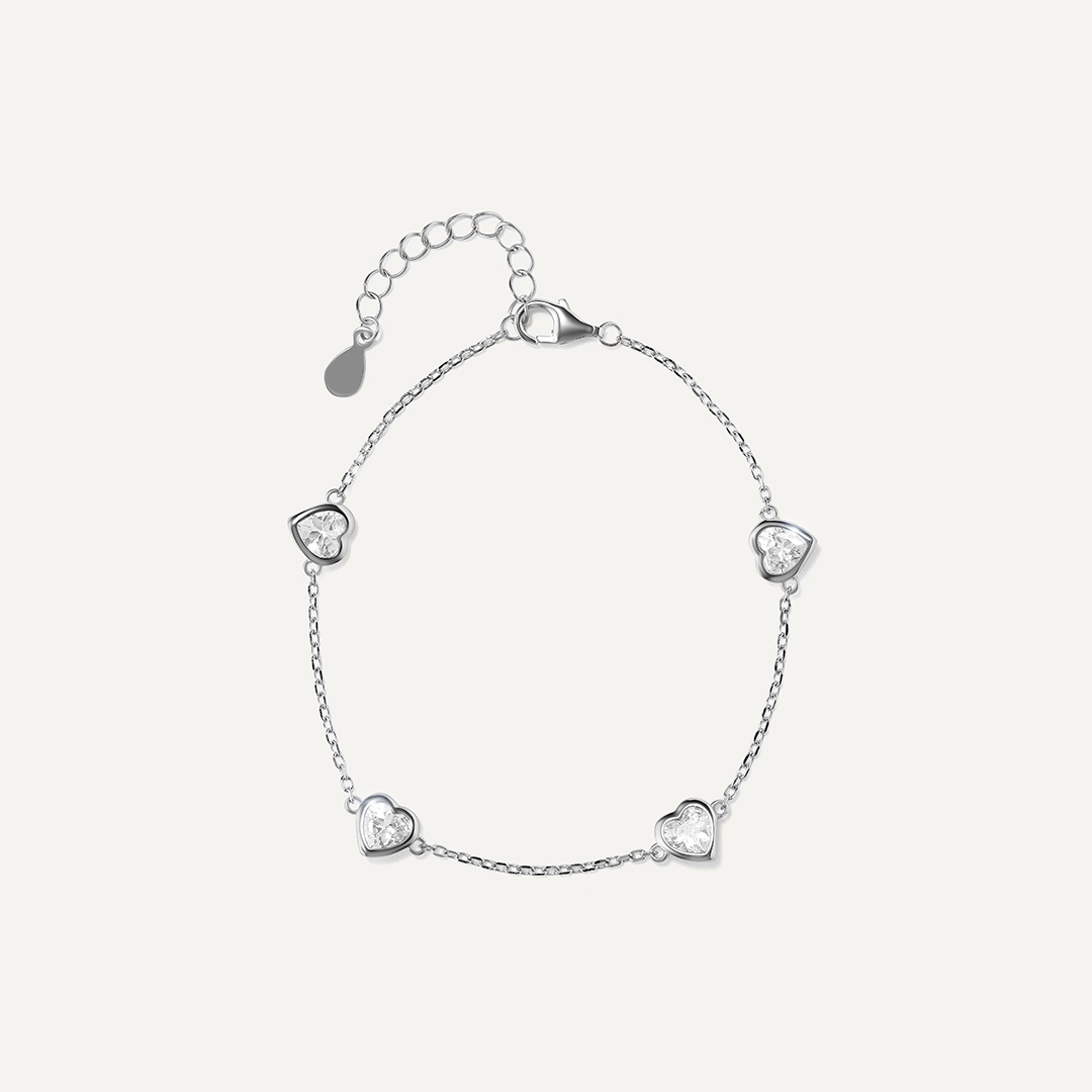 Серебряный браслет с кубическим цирконием "Сердца"