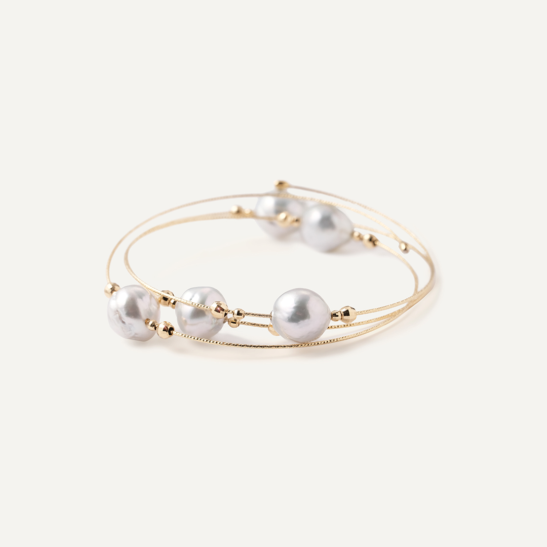 Браслет из желтого золота с серым жемчугом