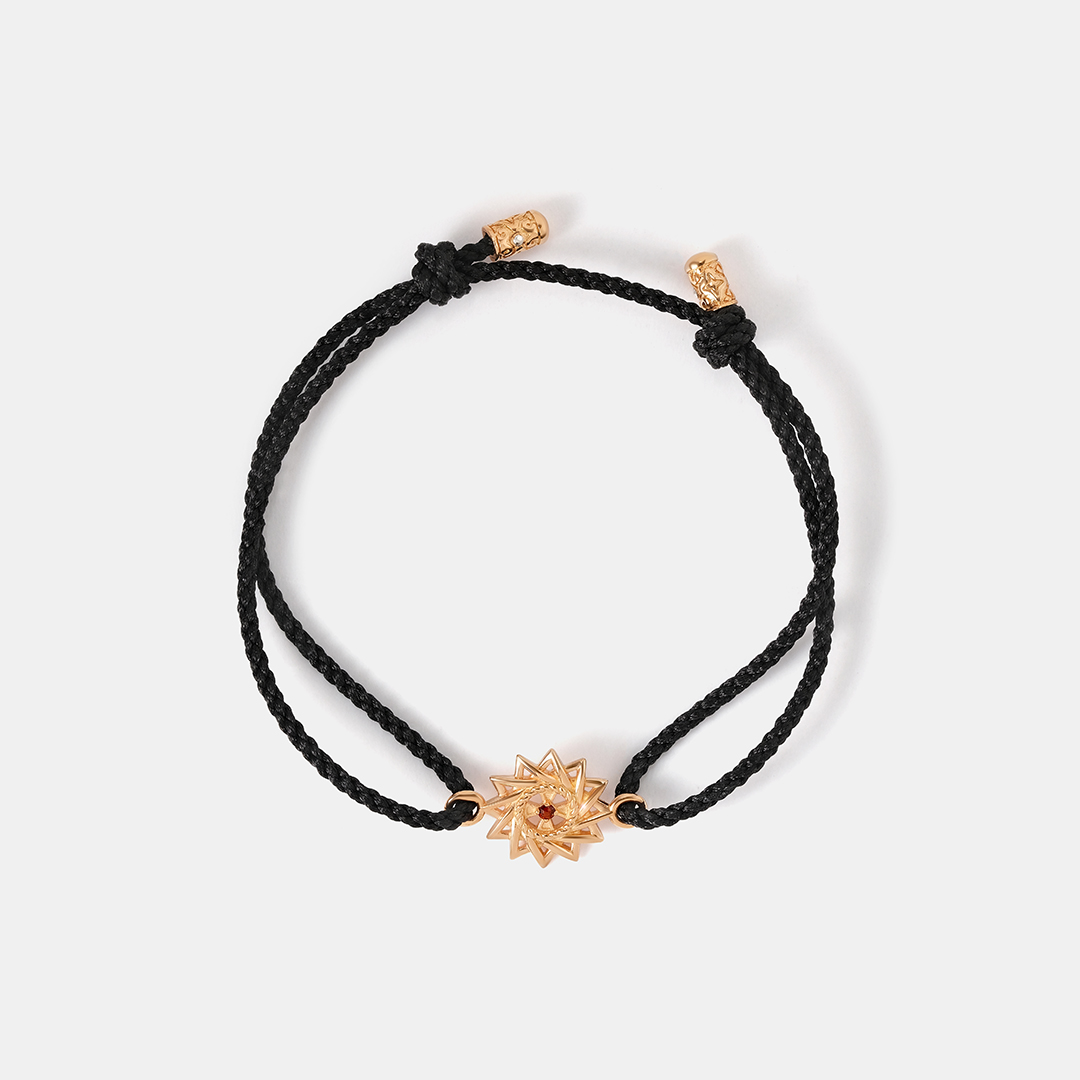 Серебряный браслет с гранатом "Эрцгамма"