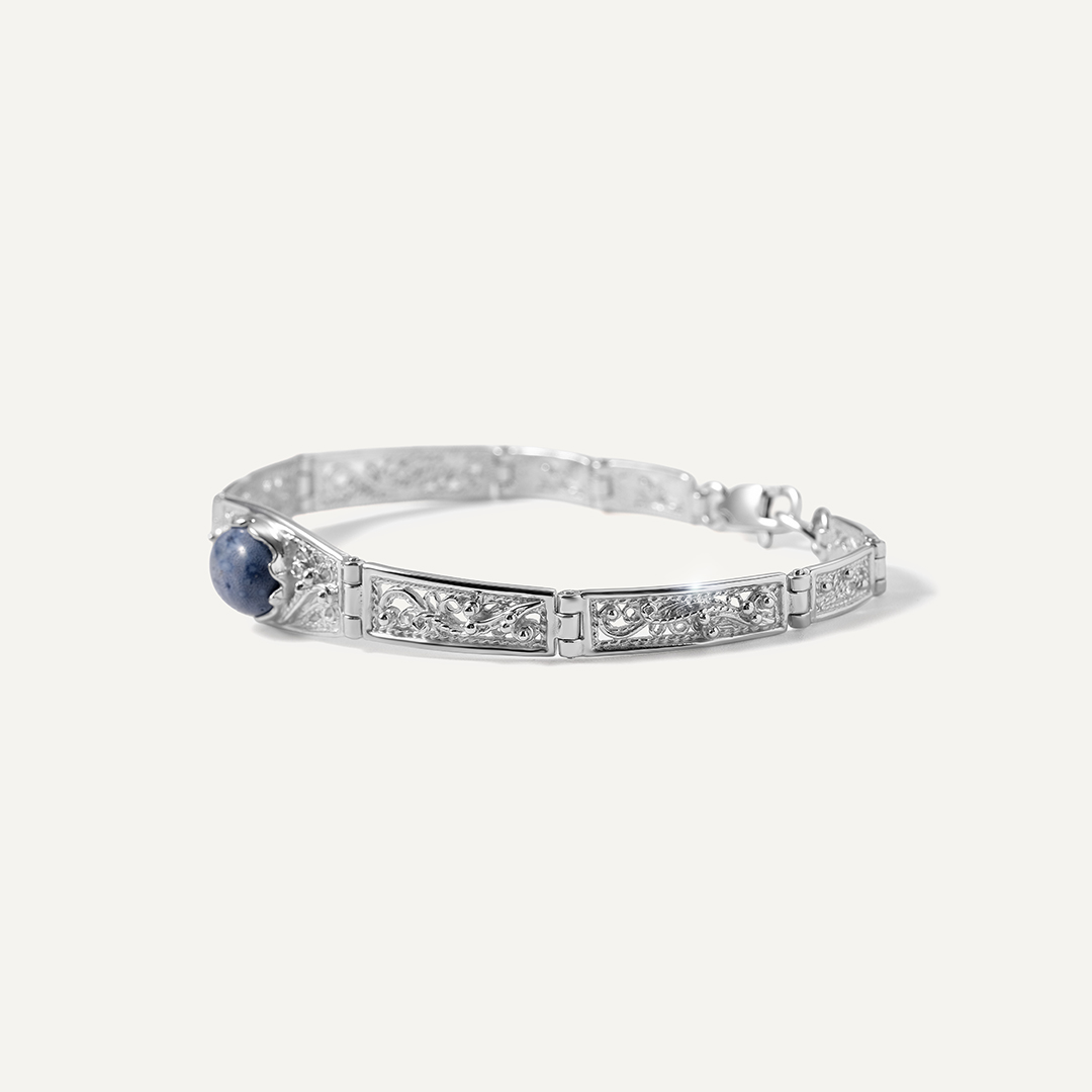 Серебряный браслет с кораллом Акори