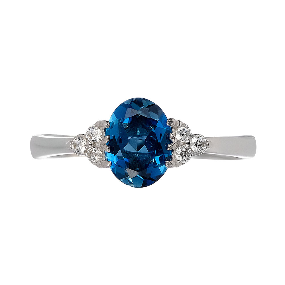 Серебряное кольцо 925 пробы; вставки 1 Топаз Лондон Блю, 6 Фианит бесцв.;