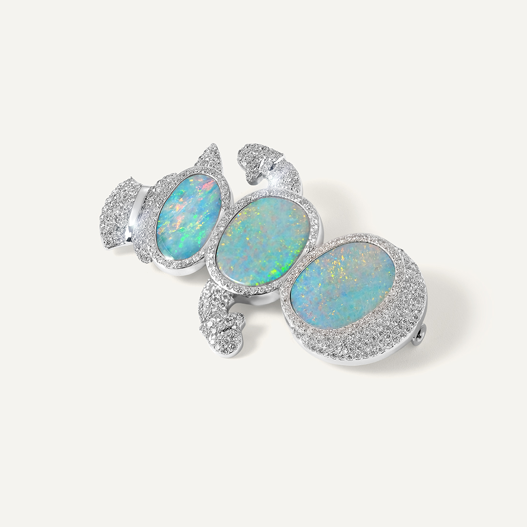 Брошь из белого золота с опалами "Снеговик"