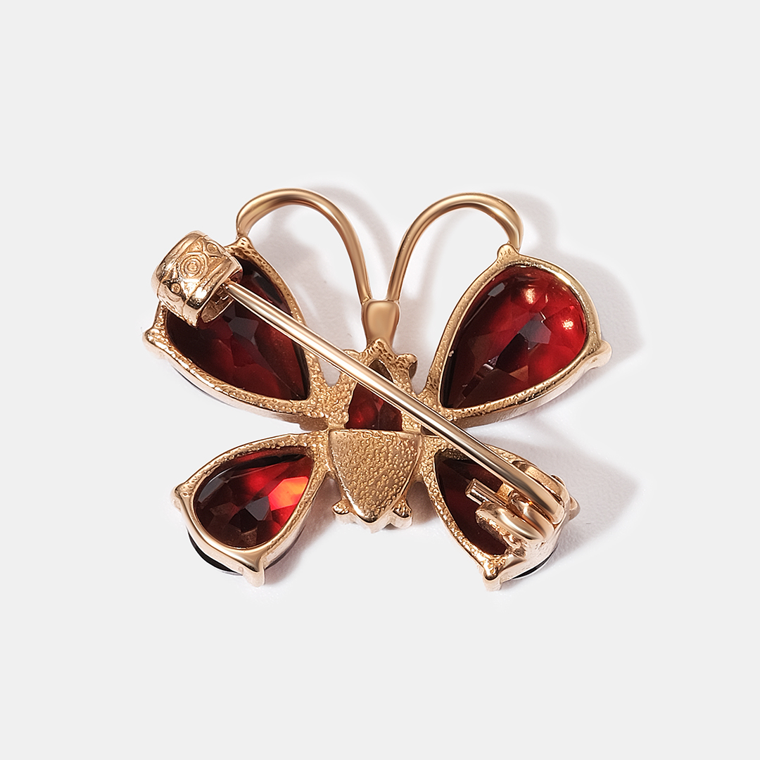 Серебряная брошь с гранатами "Бабочка"