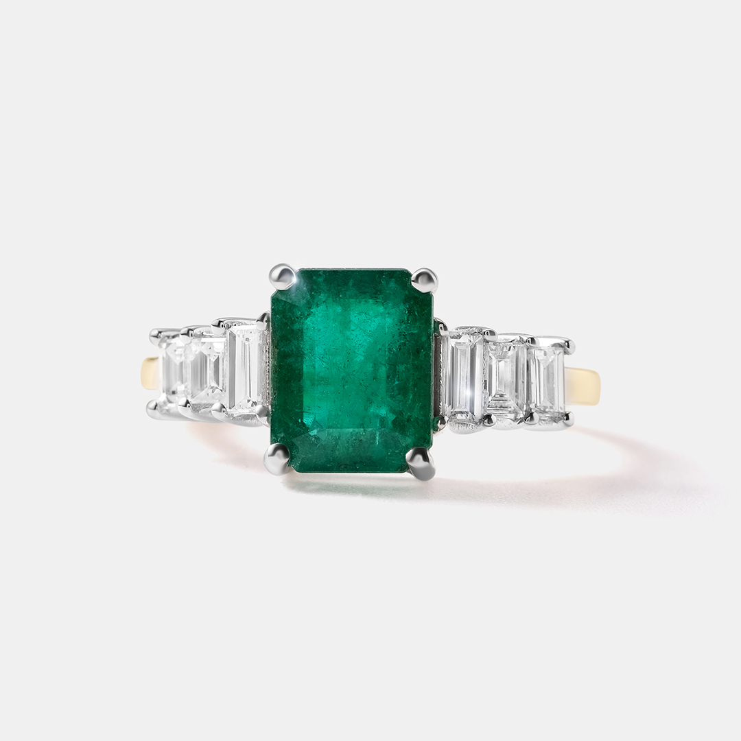 Кольцо из комбинированного золота с изумрудом