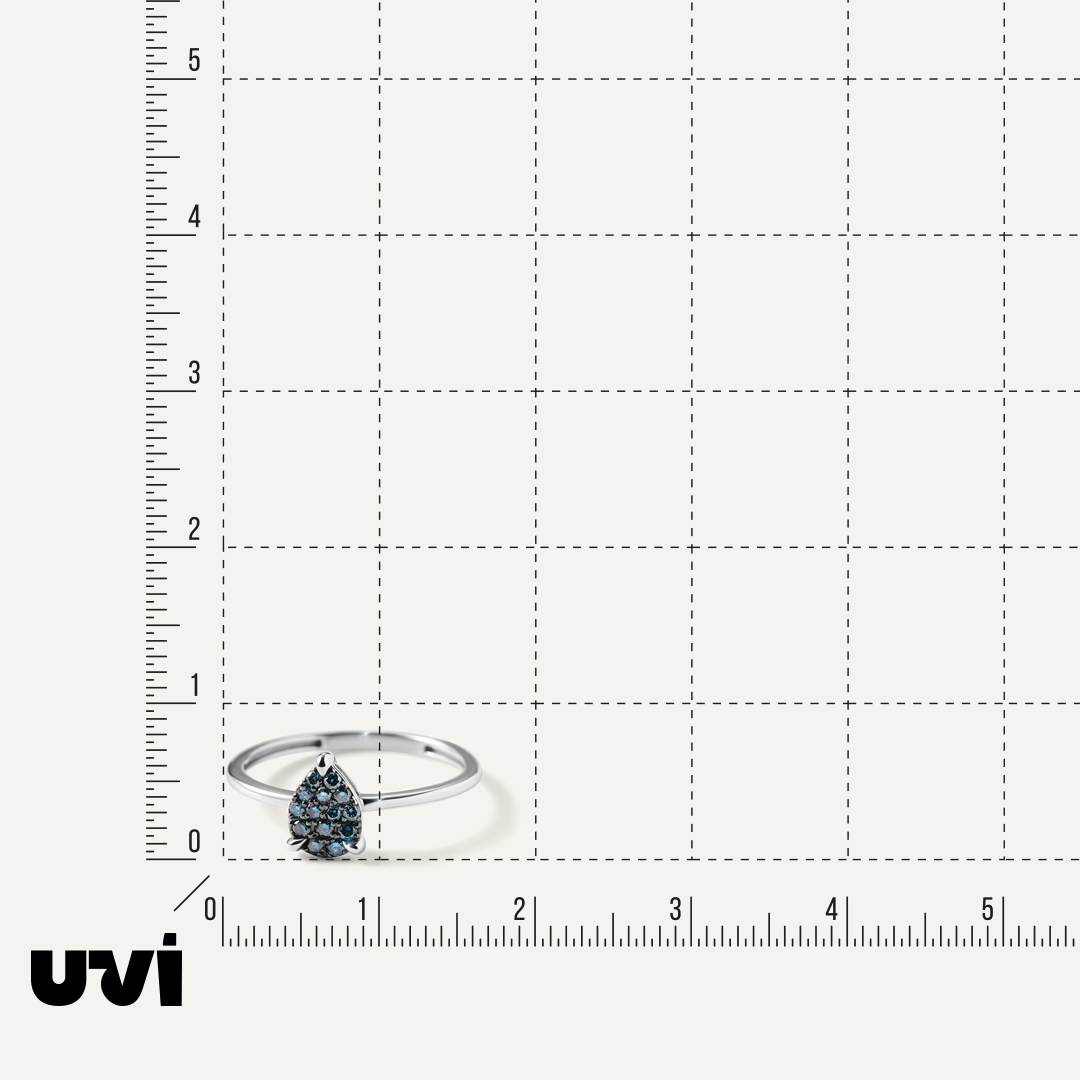 Кольцо из белого золота с голубыми бриллиантами