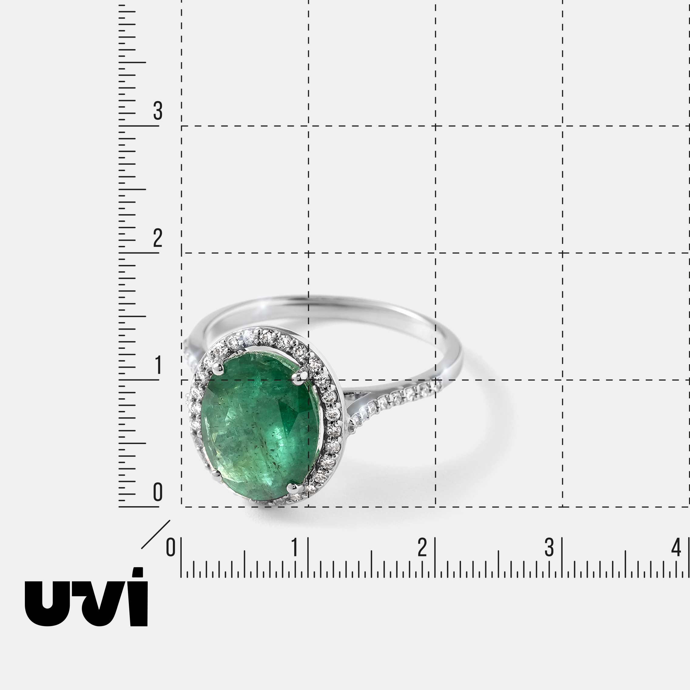 Кольцо из белого золота с изумрудом