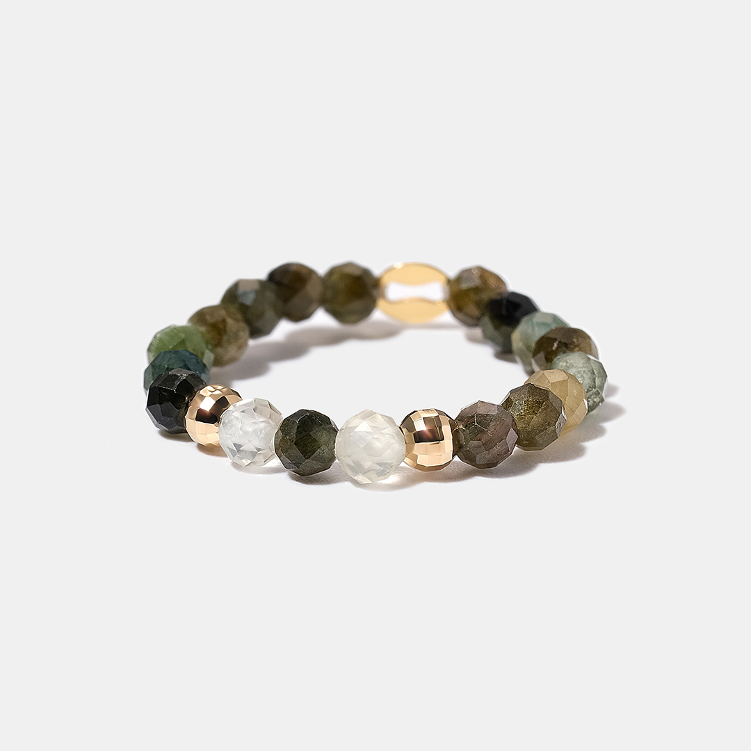 Кольцо из желтого золота с турмалинами и пренитами