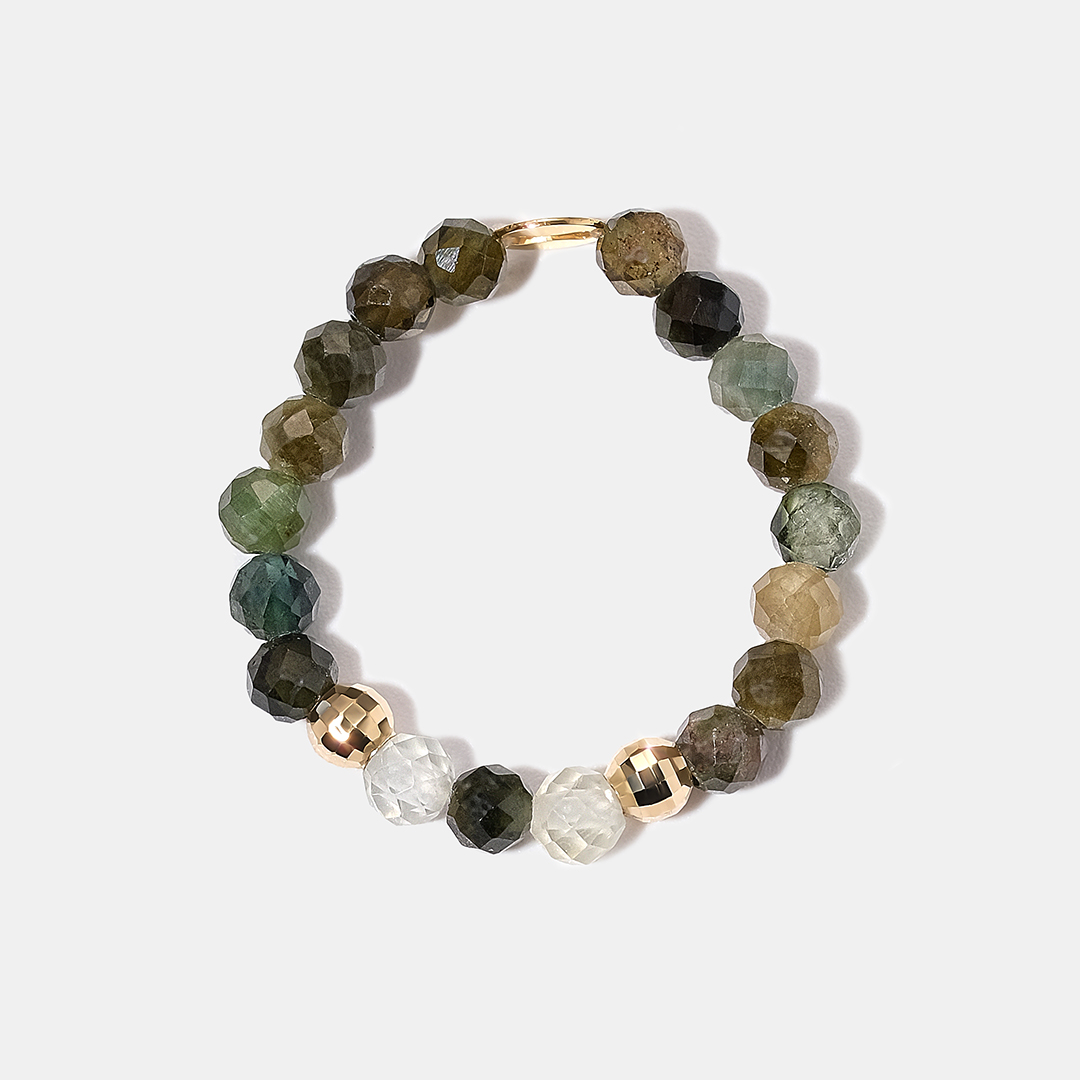 Кольцо из желтого золота с турмалинами и пренитами