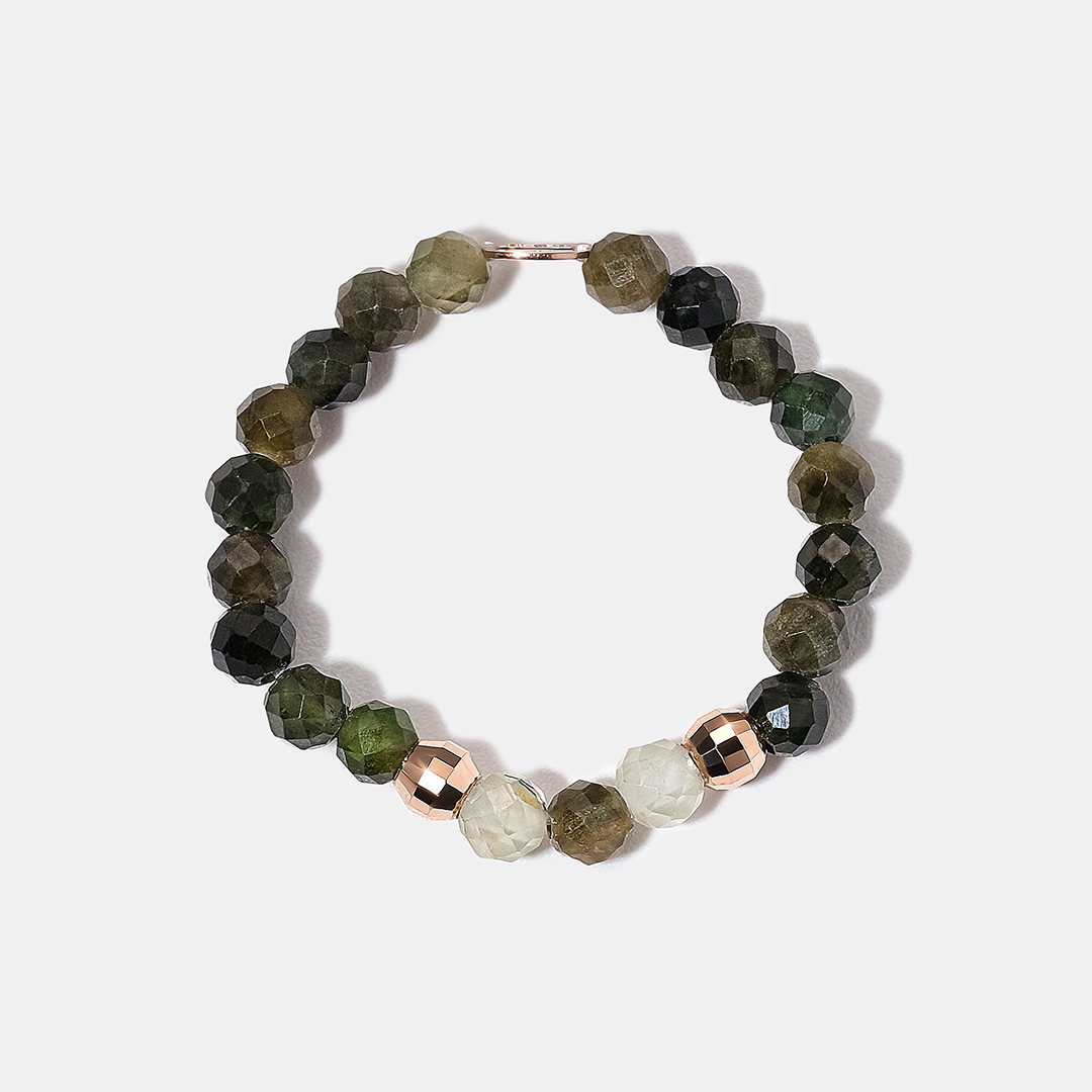 Кольцо из золота с турмалинами и пренитами