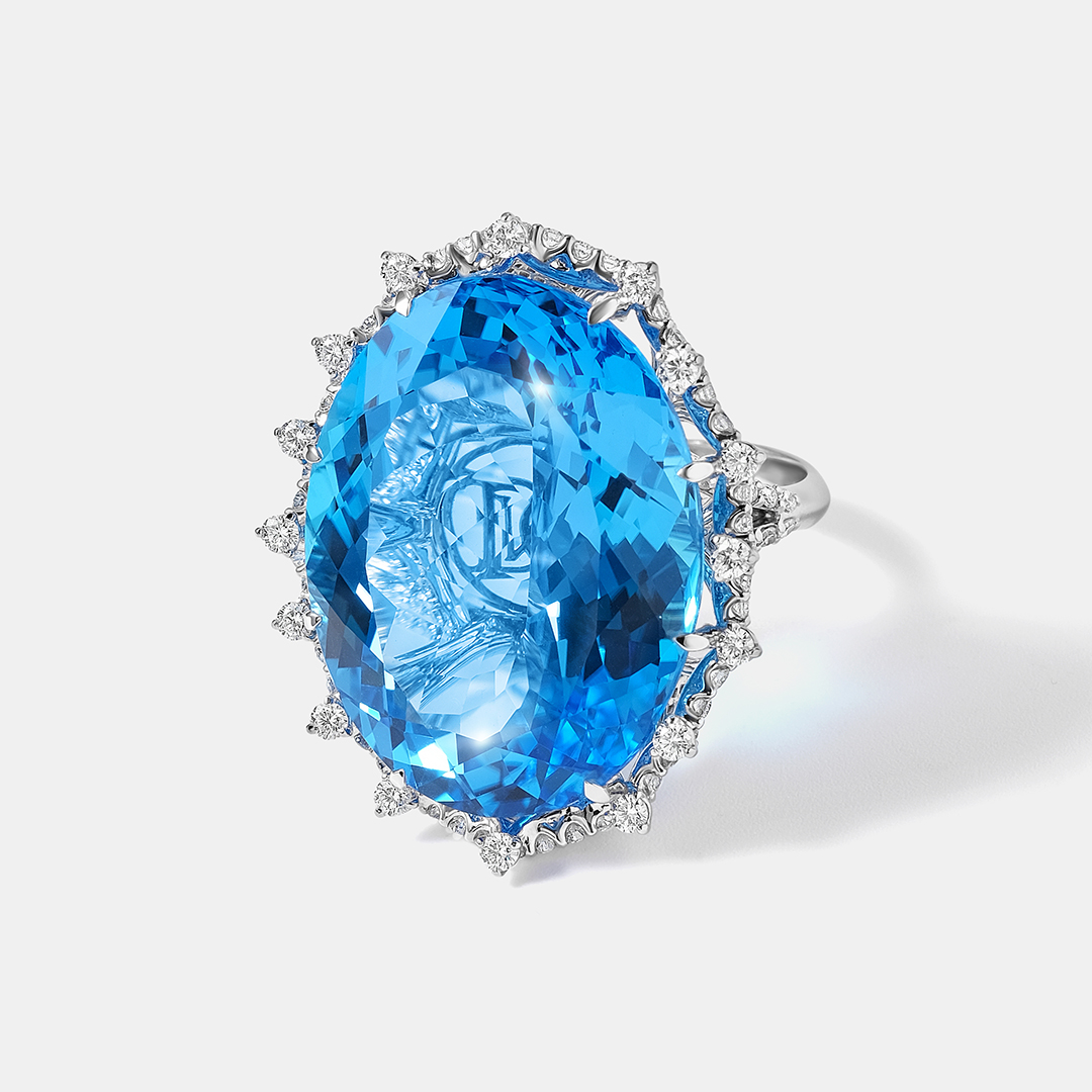 Кольцо из белого золота с топазом