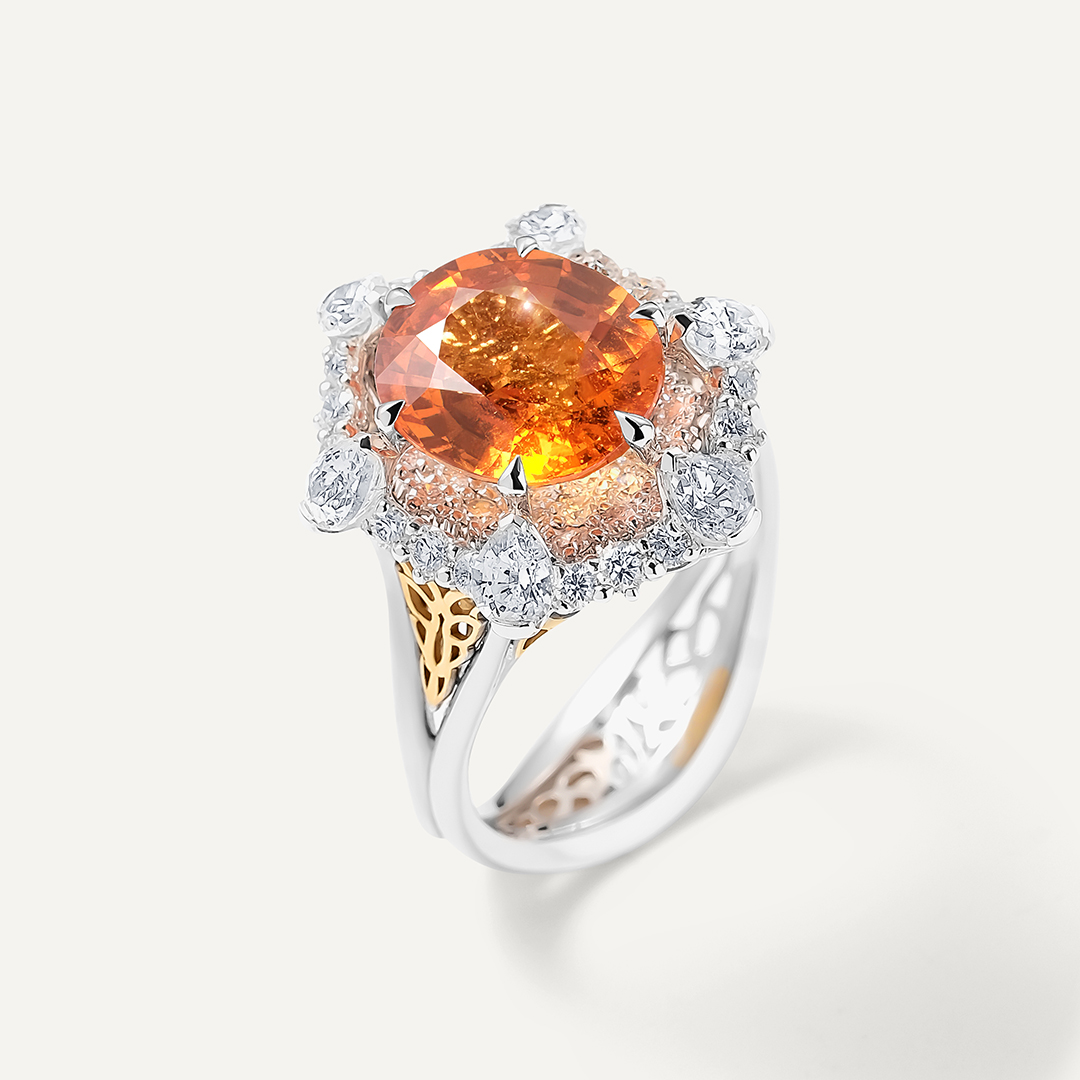 Кольцо из комбинированного золота со спессартином