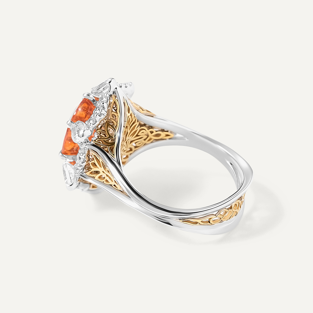 Кольцо из комбинированного золота со спессартином