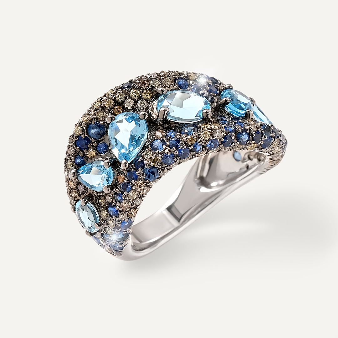 Кольцо из белого золота с топазами