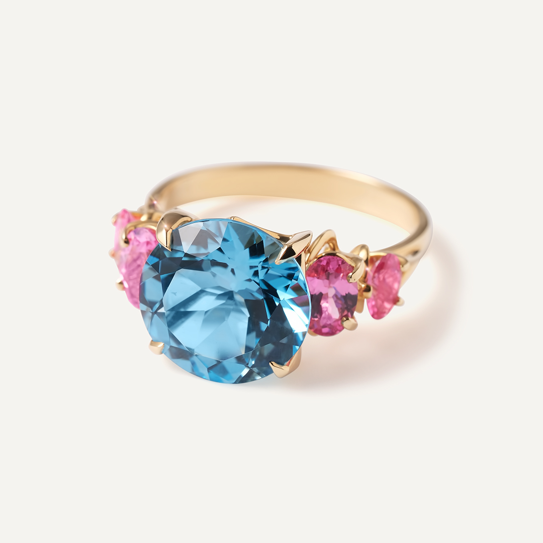 Кольцо из желтого золота с топазом и розовой шпинелью