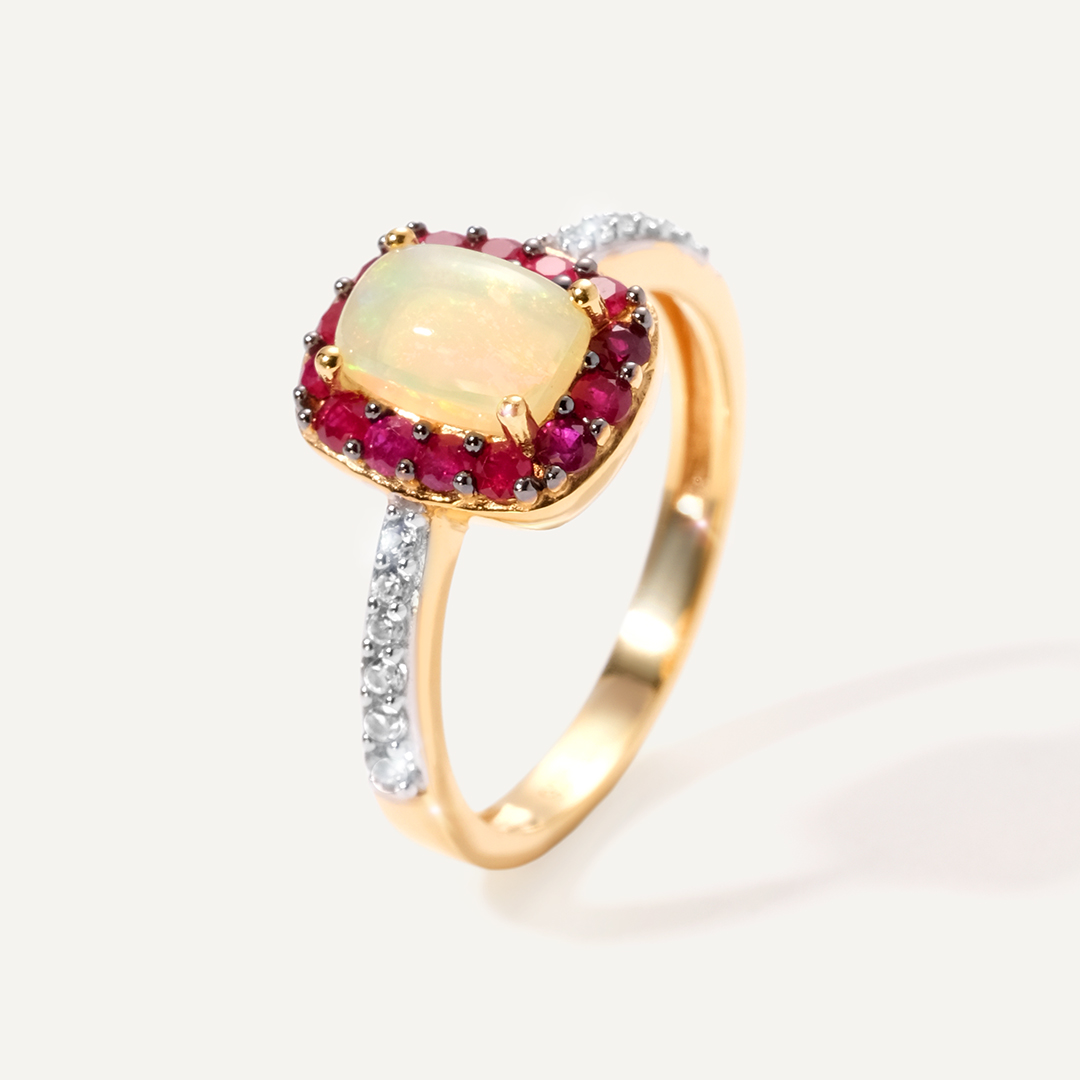 Серебряное кольцо с опалом и рубинами