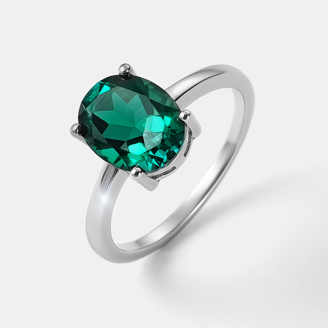 Серебряное кольцо с выращенным изумрудом