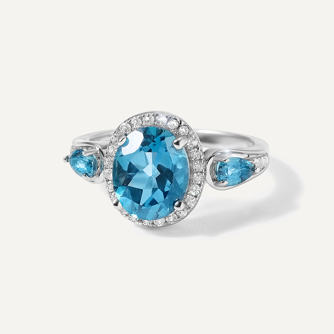 Серебряное кольцо с топазами Параиба