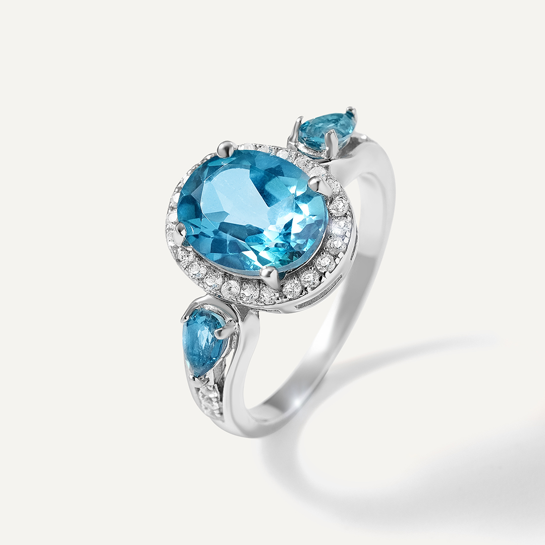 Серебряное кольцо с топазами Параиба