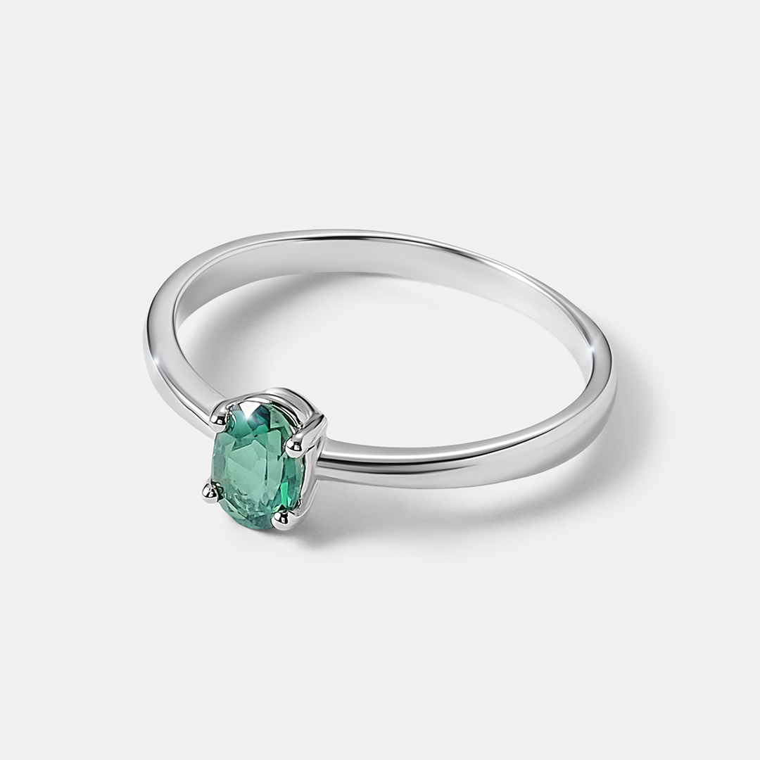 Серебряное кольцо с зеленым топазом