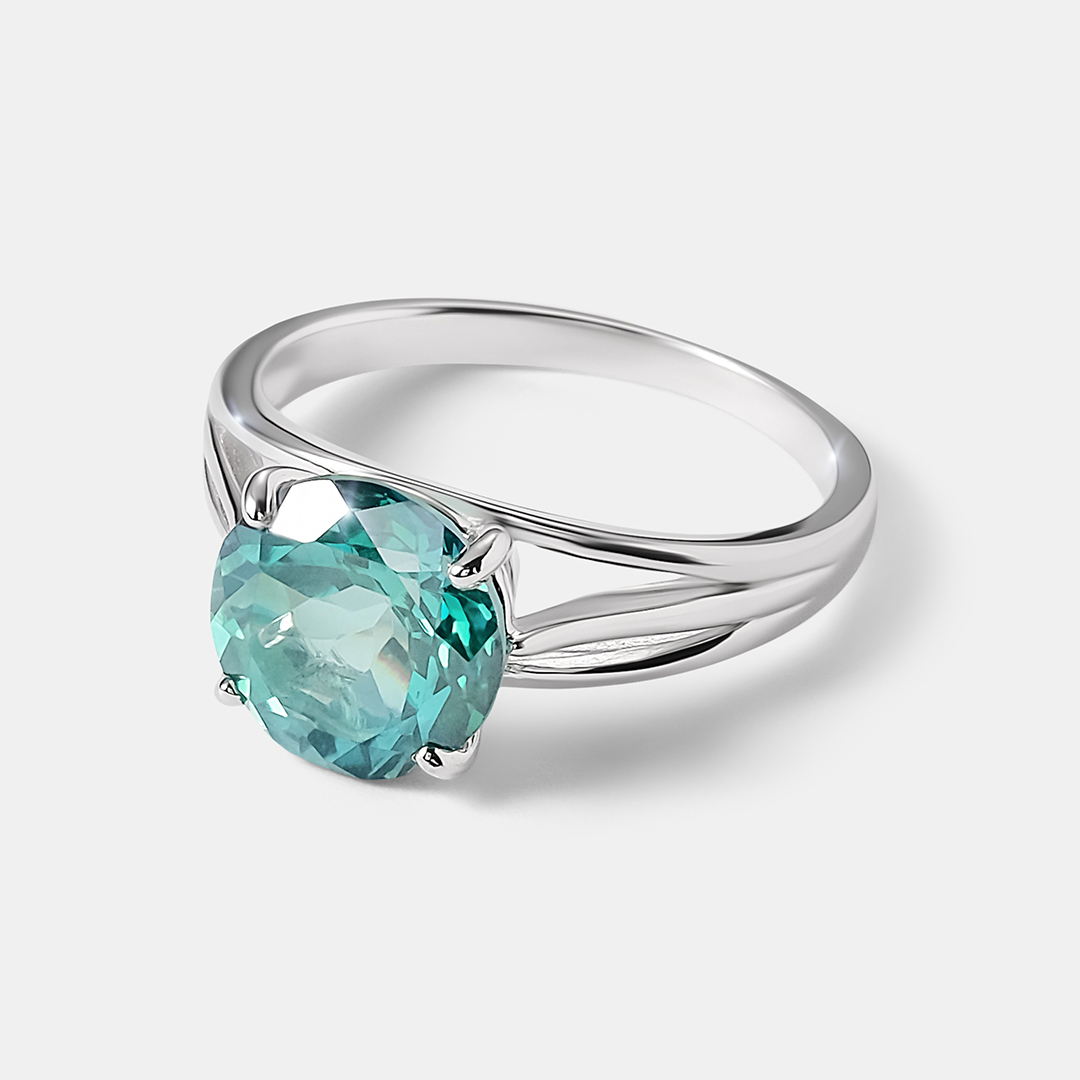 Серебряное кольцо с зеленым топазом