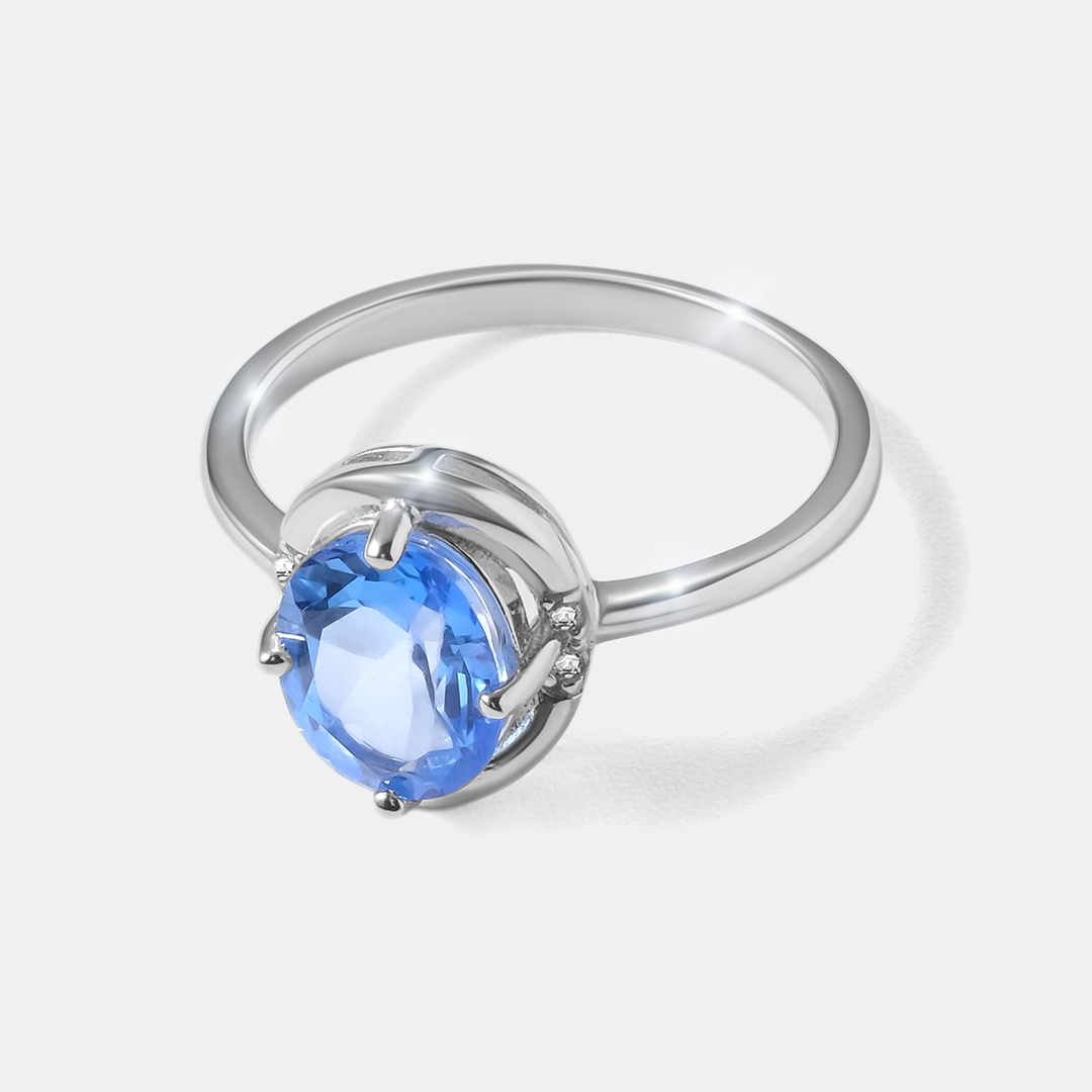 Серебряное кольцо с топазами Индиго