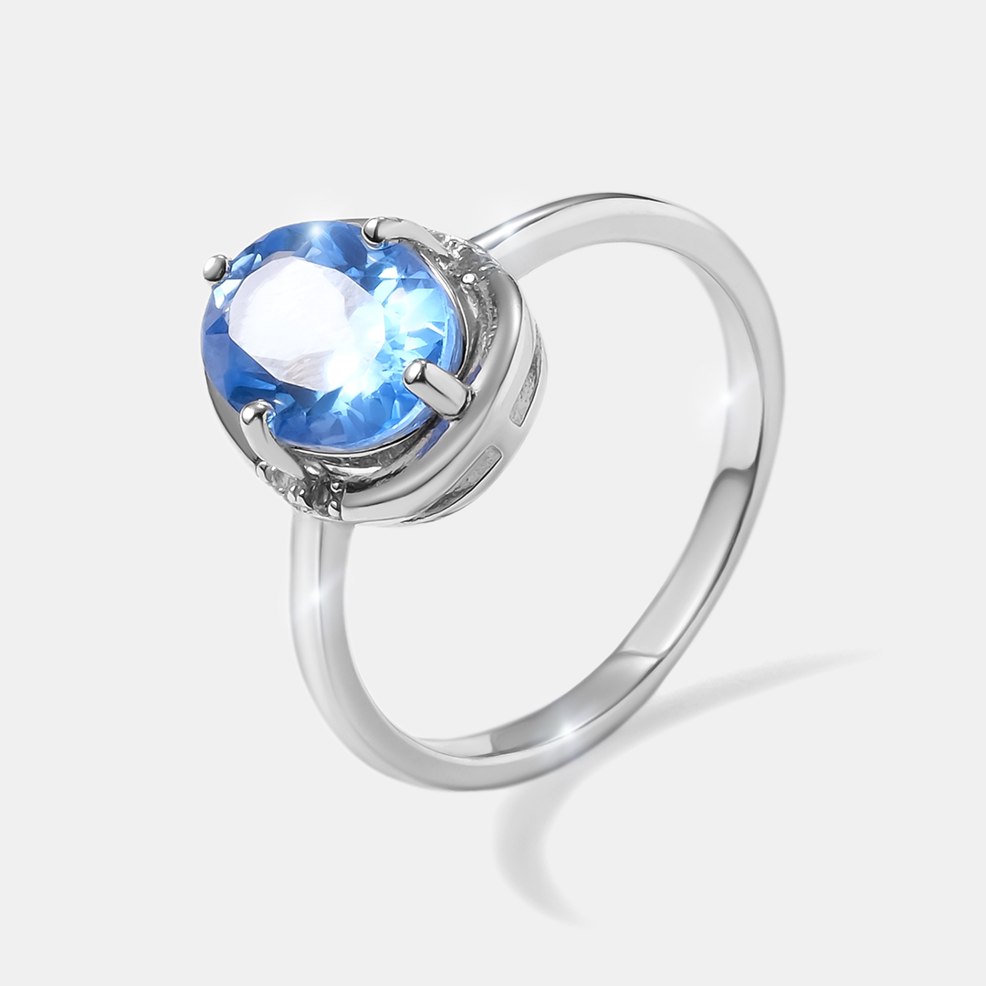Серебряное кольцо с топазами Индиго