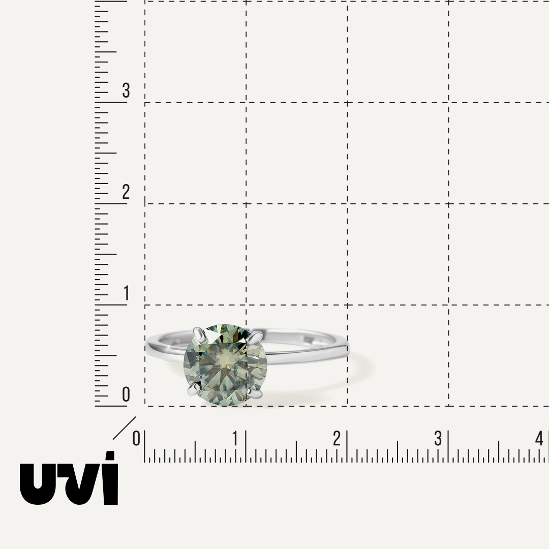 Серебряное кольцо с зеленым муассанитом