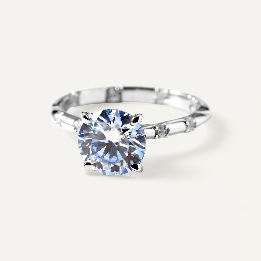 Серебряное кольцо с голубым муассанитом 2в1