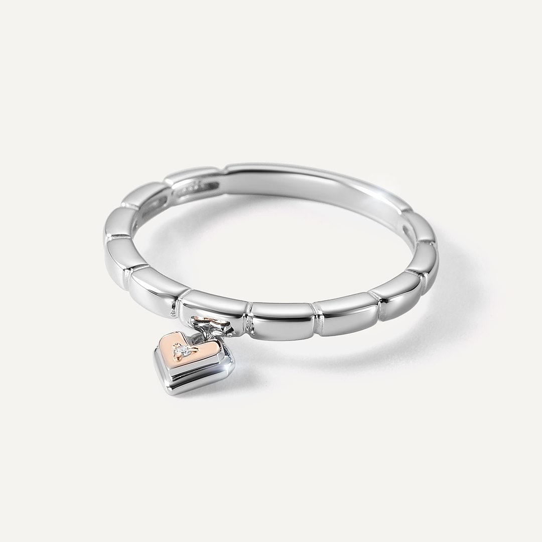 Серебряное кольцо с бриллиантом и золотом "Сердце"