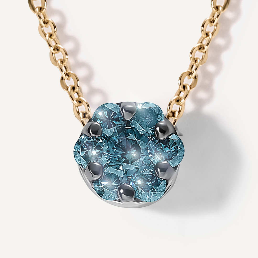 Подвеска из белого золота с голубыми бриллиантами