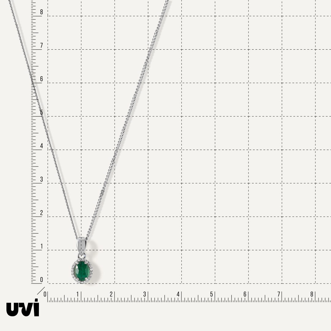 Подвеска из белого золота с изумрудом