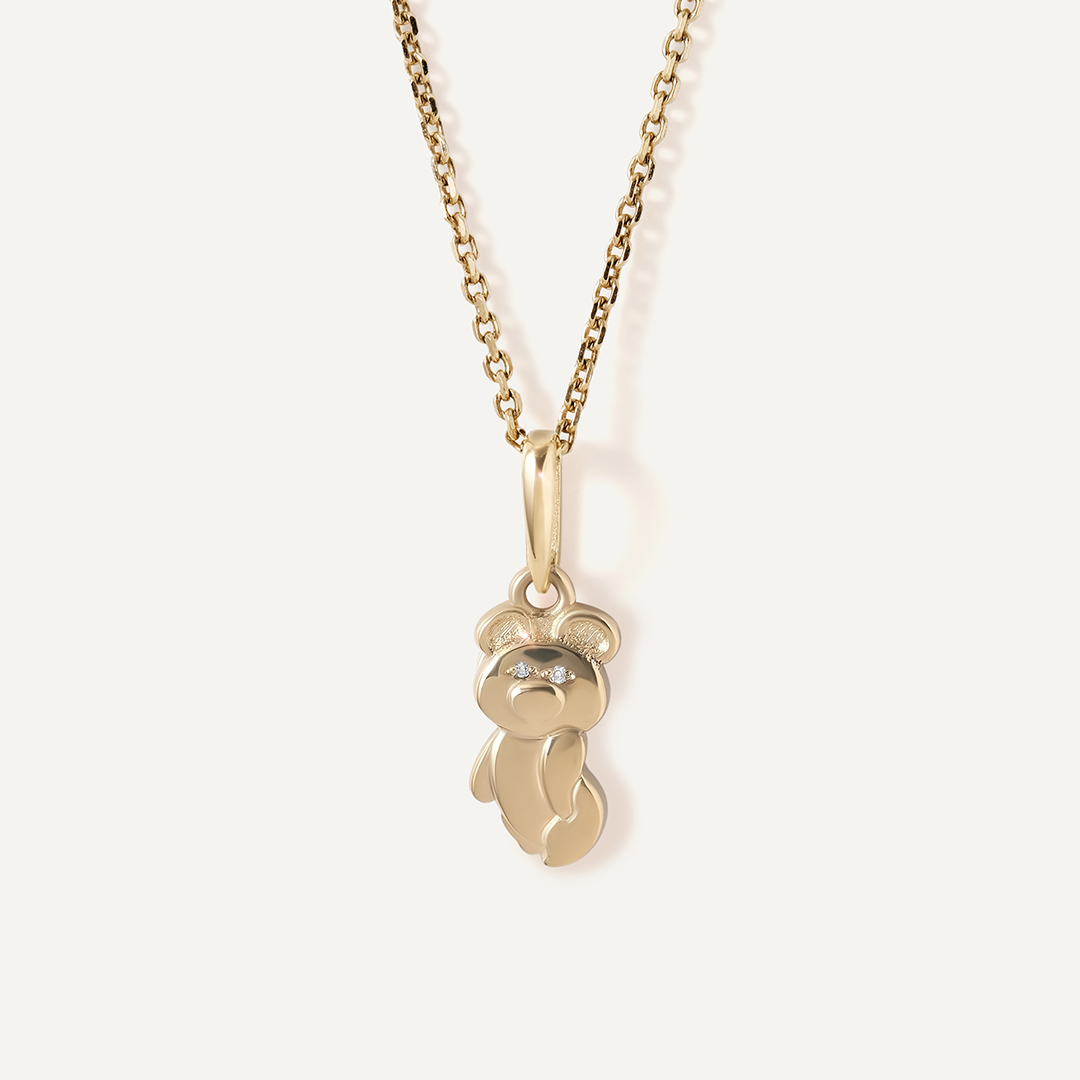 Подвеска из желтого золота с бриллиантами "Олимпийский Мишка"