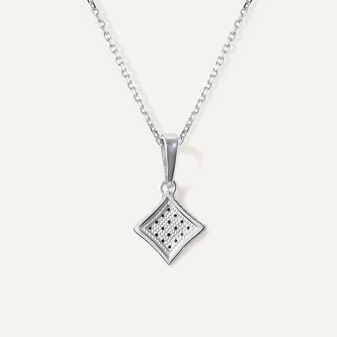 Подвеска из белого золота с голубыми бриллиантами