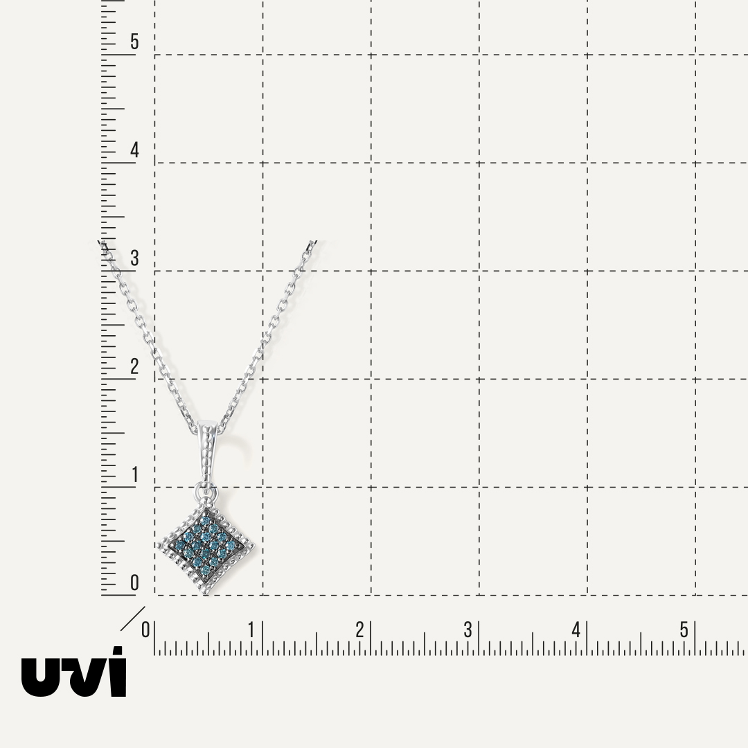 Подвеска из белого золота с голубыми бриллиантами