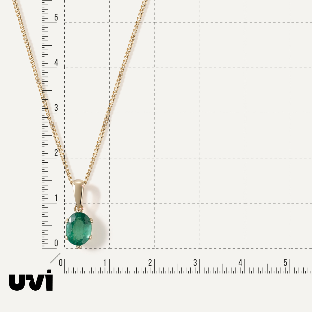 Подвеска из желтого золота с изумрудом