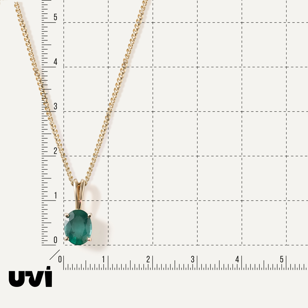 Подвеска из желтого золота с изумрудом