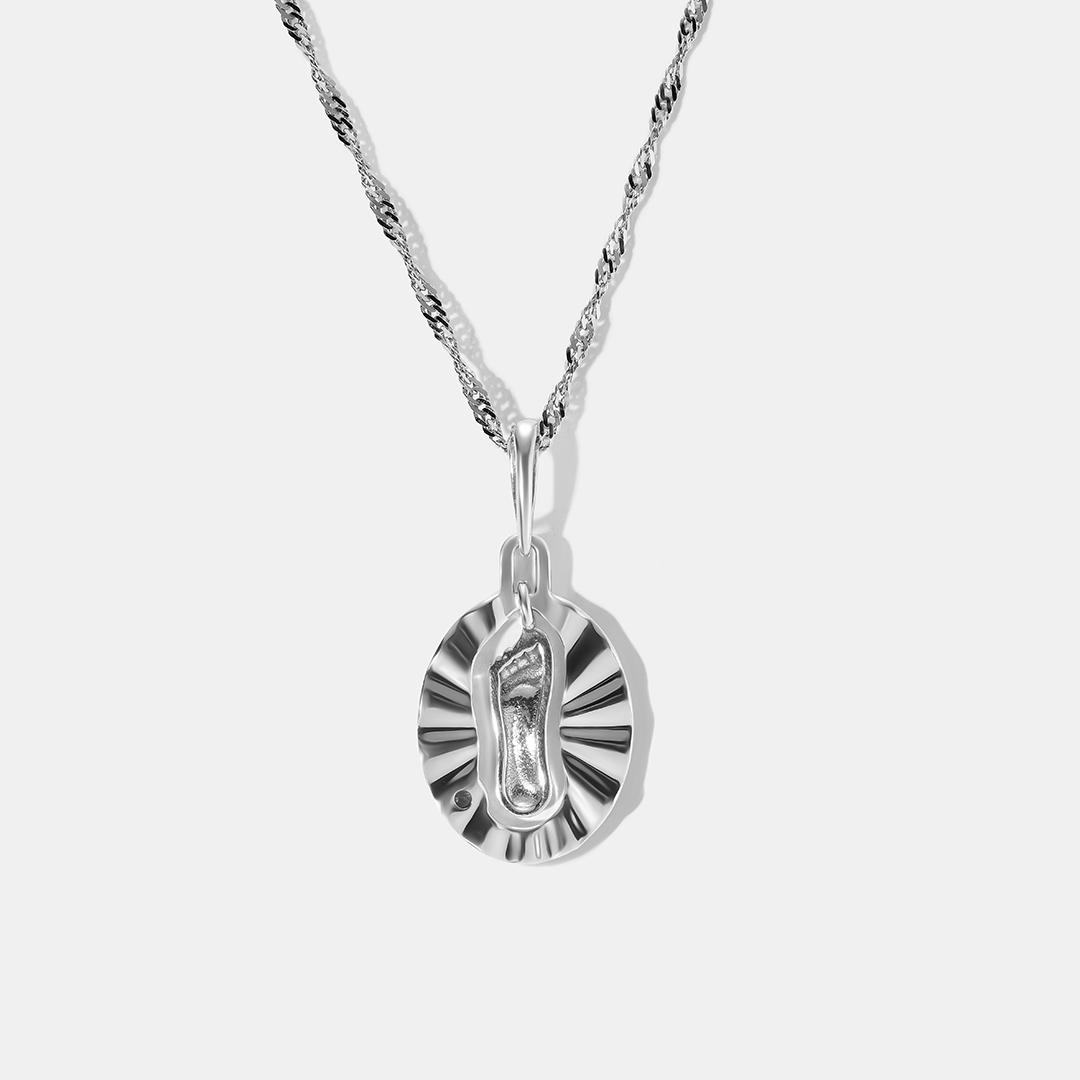 Серебряная подвеска с танзанитом "Стопа Богородицы"