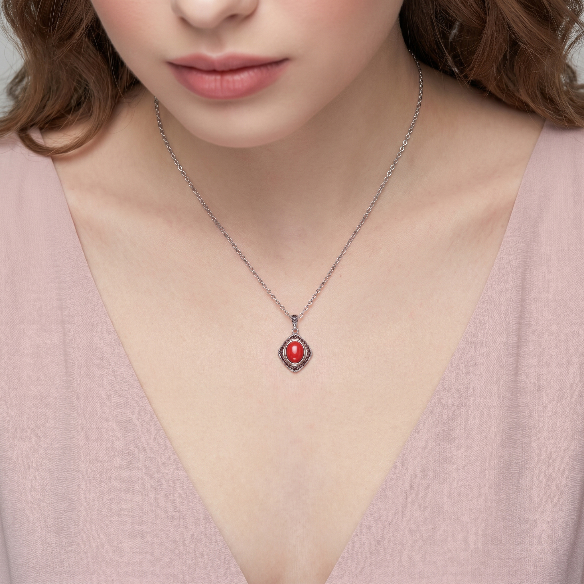 Серебряная подвеска с кораллом
