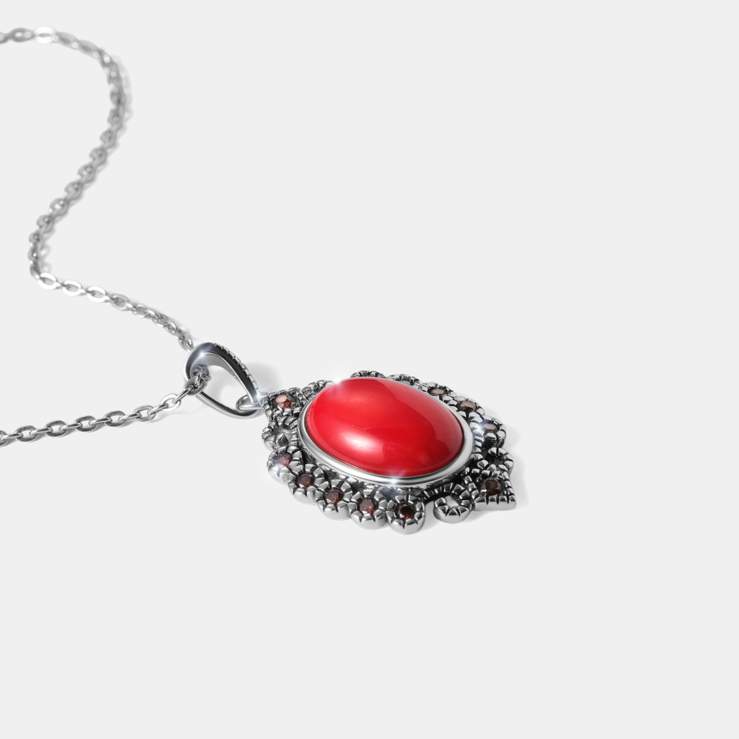 Серебряная подвеска с кораллом