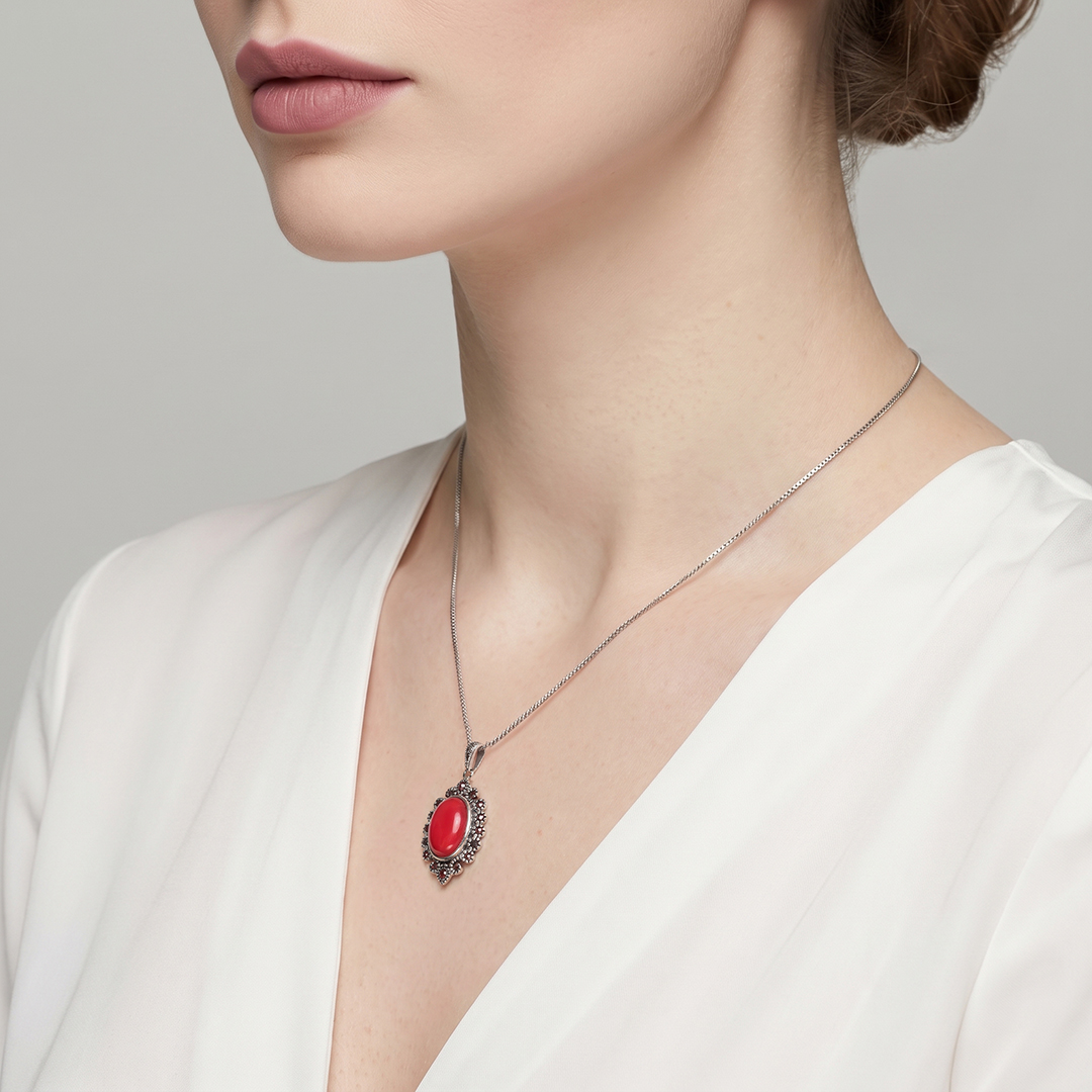Серебряная подвеска с кораллом