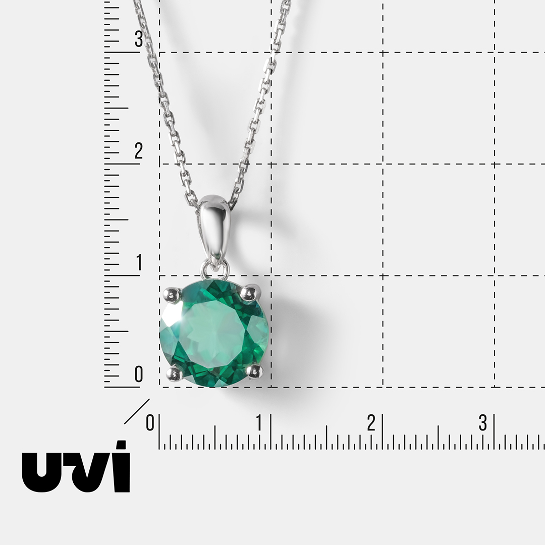 Серебряная подвеска с зеленым топазом
