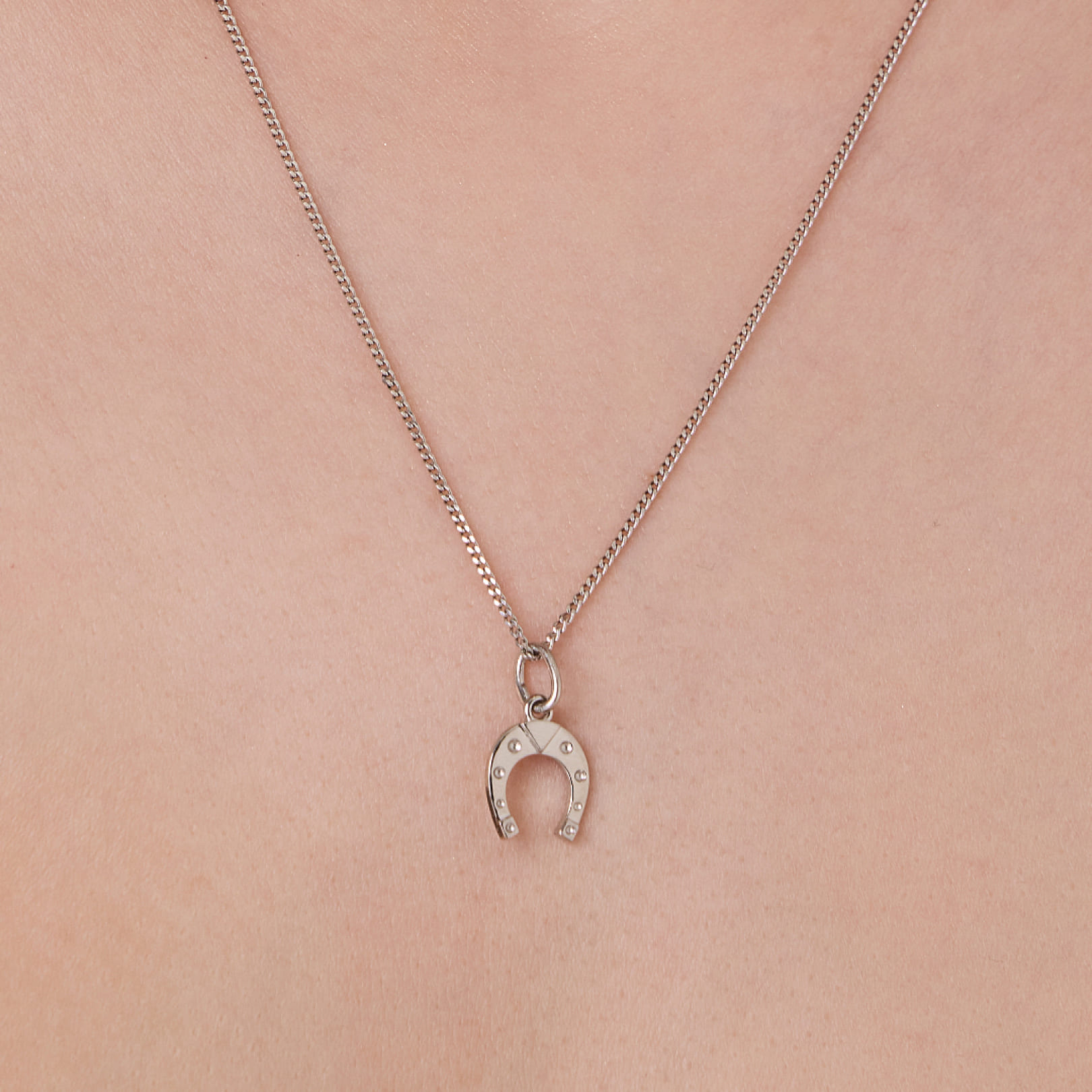 Подвеска из платины "Подкова"