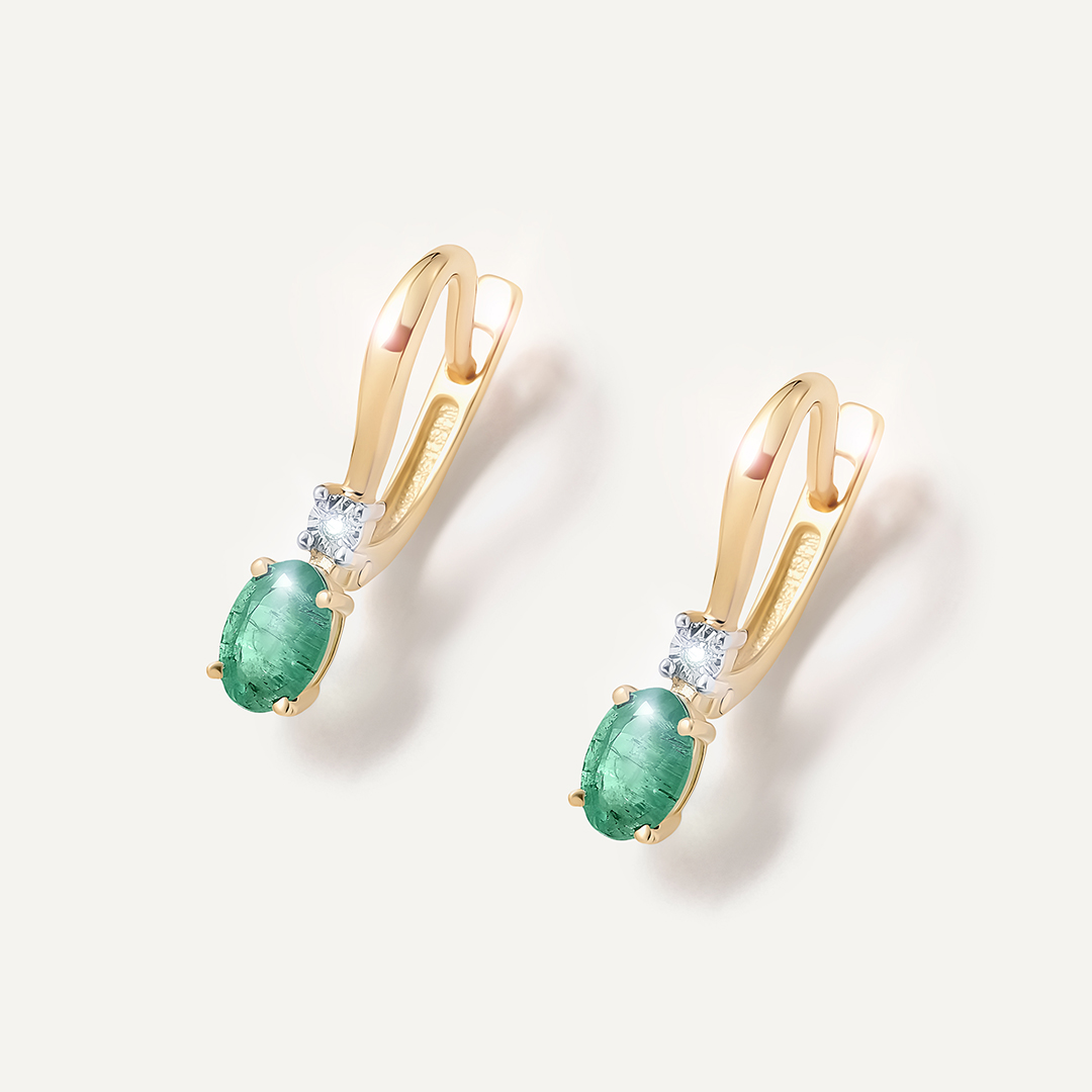 Серьги из желтого золота с изумрудами
