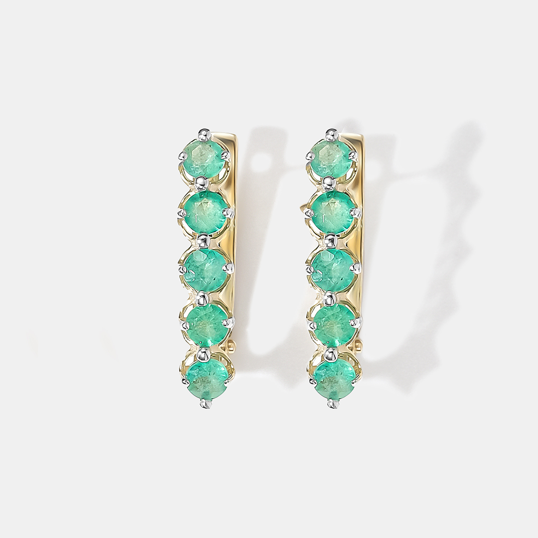 Серьги из желтого золота с изумрудами