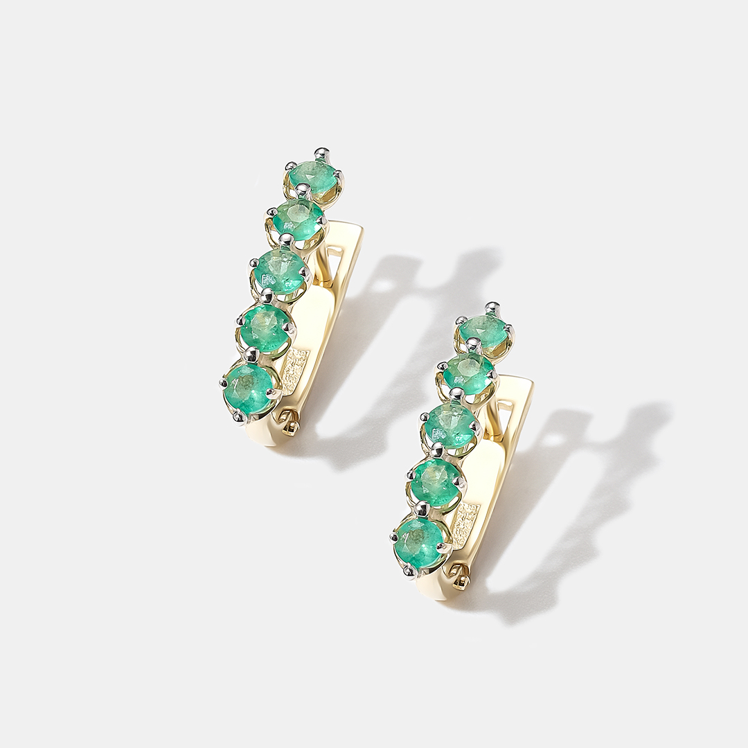 Серьги из желтого золота с изумрудами