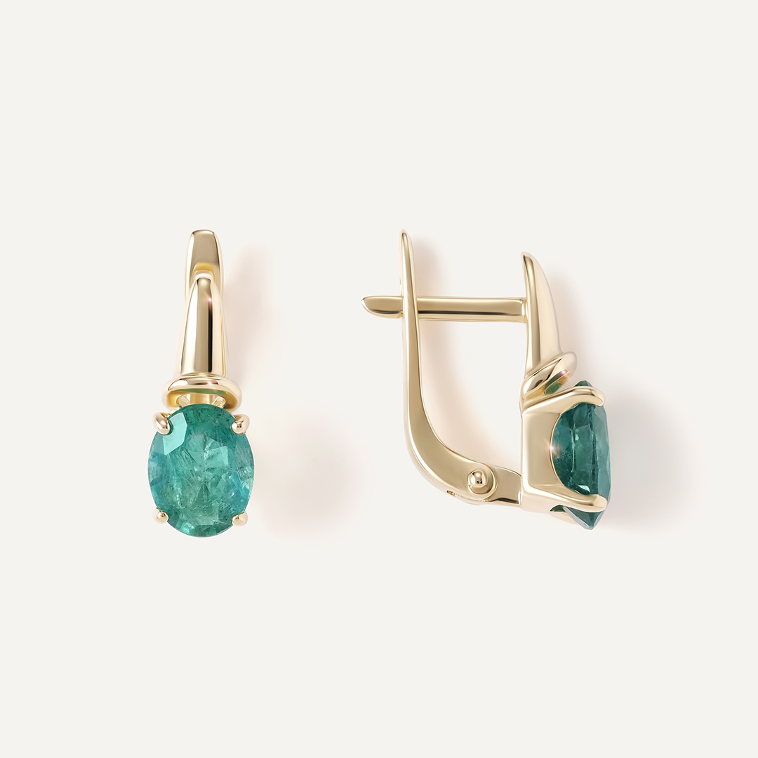 Серьги из желтого золота с изумрудами