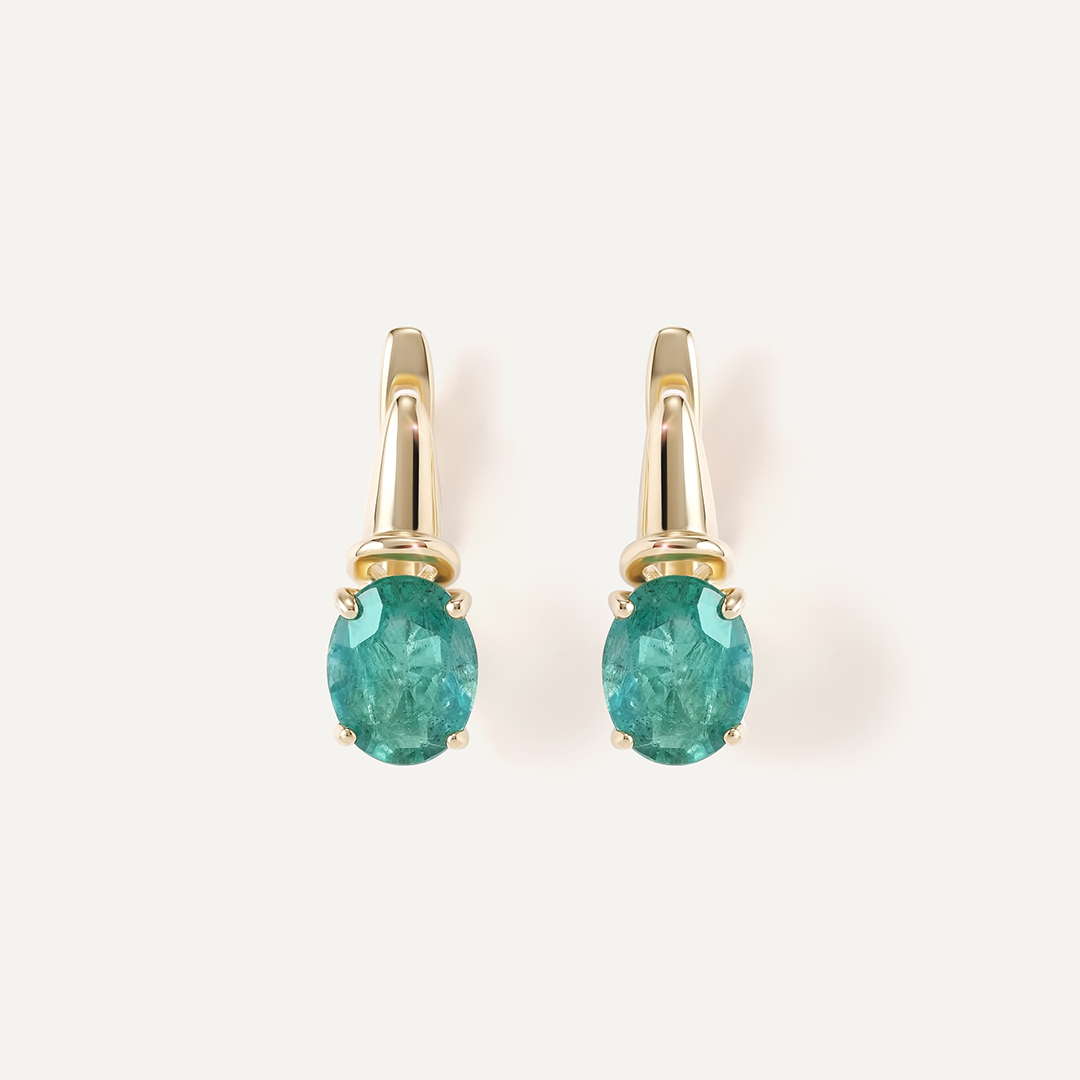 Серьги из желтого золота с изумрудами